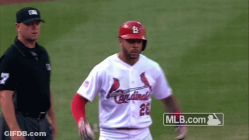 Baseball Player In Cardinals Uniform Standing On Field GIF