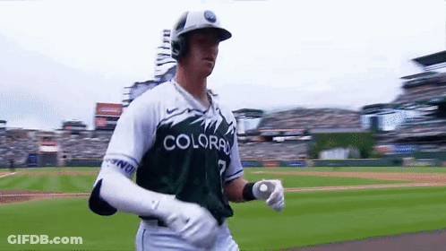 Baseball Player In Colorado Uniform Running GIF