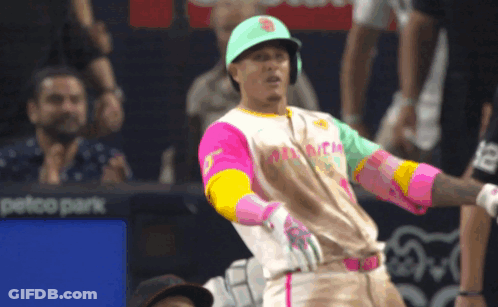 Baseball Player In Colorful Jersey And Green Hat GIF