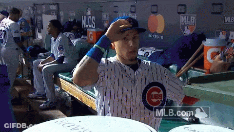 Baseball Player In Cubs Uniform Adjusting Hat GIF