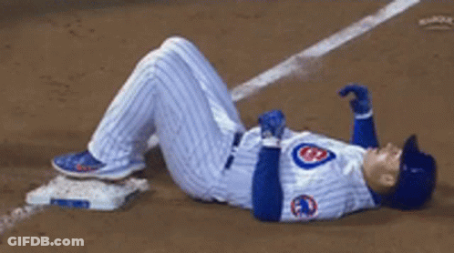 Baseball Player In Cubs Uniform Lying GIF
