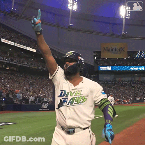 Baseball Player In Devil Rays Uniform Holding Up Hand GIF