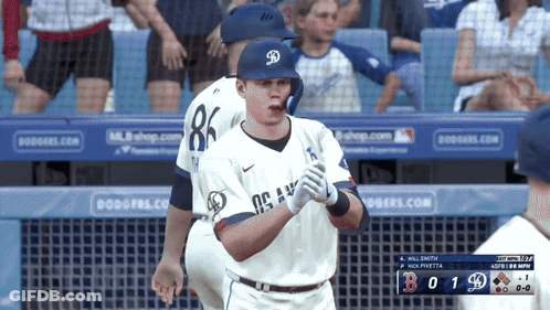 Baseball Player In Dodgers Jersey In Front Of Scoreboard GIF