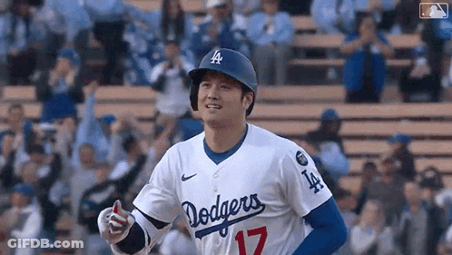 Baseball Player In Dodgers Uniform Standing On Field GIF