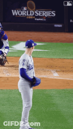 Baseball Player In Dodgers Uniform Standing On Field GIF