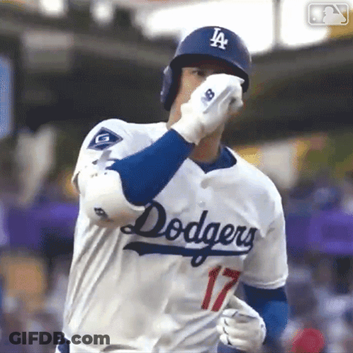 Baseball Player In Dodgers Uniform Wiping Nose GIF
