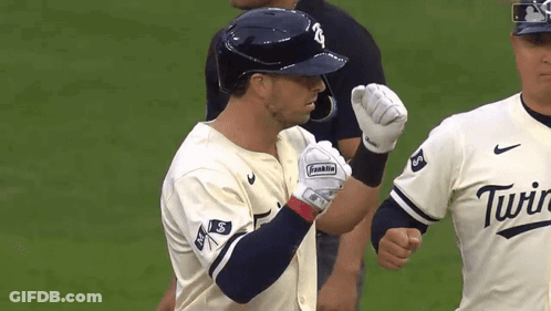 Baseball Player In Franklin Glove Holds Up Fist GIF