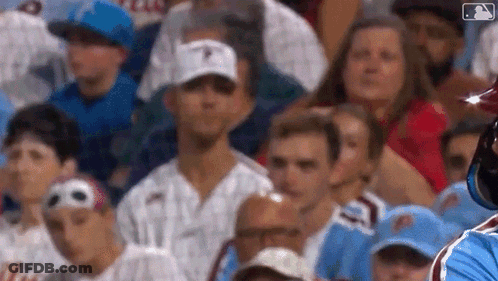 Baseball Player In Front Of Crowd Watching Game GIF