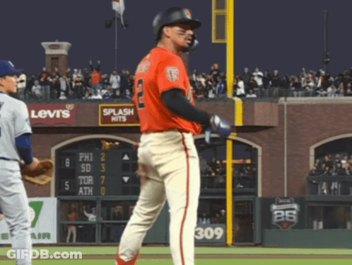 Baseball Player In Front Of Levi's Sign GIF