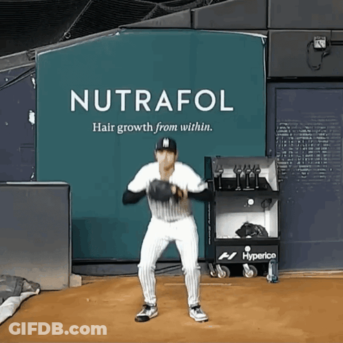 Baseball Player In Front Of Nutrafol Sign GIF