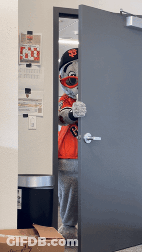 Baseball Player In Giants Jersey And Black Helmet GIF
