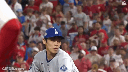 Baseball Player In LA Hat Facing Crowd GIF