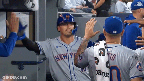 Baseball Player In Mets Uniform High Fiving Teammates GIF