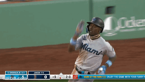 Baseball Player In Miami Jersey Runs To Base GIF