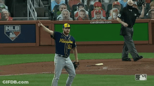 Baseball Player In Milwaukee Jersey Standing On Field GIF