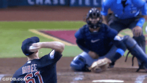 Baseball Player In Number 61 Jersey Ready To Throw Ball GIF