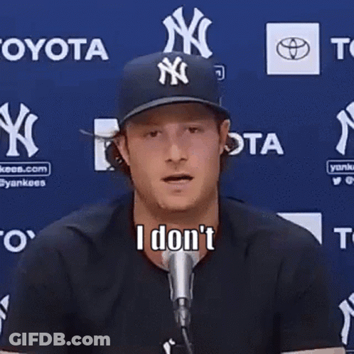 Baseball Player In NY Hat And Striped Shirt GIF