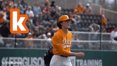Baseball Player In Orange Jersey With Letter K GIF