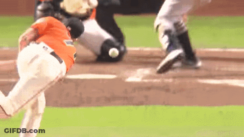 Baseball Player In Orange Jersey With Letter T GIF