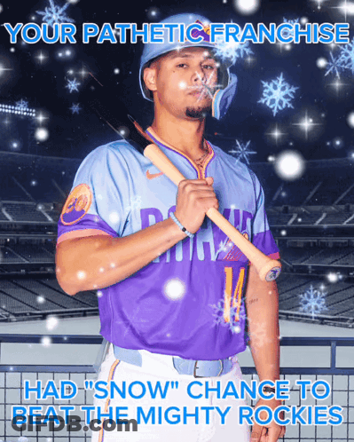 Baseball Player In Purple Jersey Holding Bat GIF