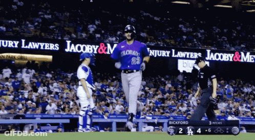 Baseball Player In Purple Uniform Number 23 GIF