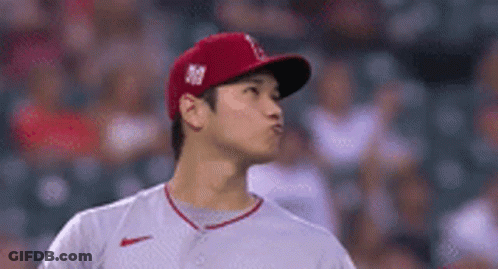 Baseball Player In Red Hat And White Shirt GIF