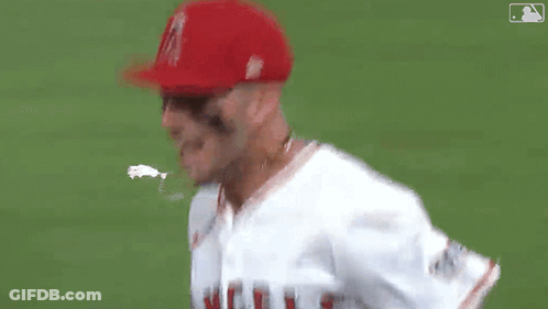 Baseball Player In Red Hat And White Shirt GIF
