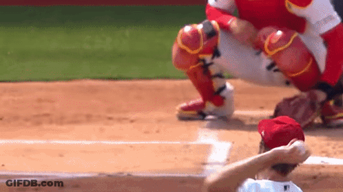 Baseball Player In Red Hat Kneeling GIF