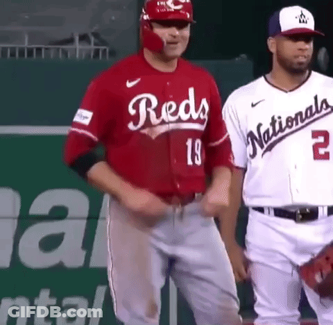 Baseball Player In Red Jersey Next To Player In White Jersey GIF