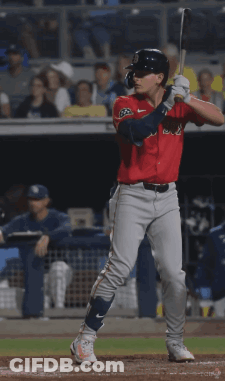 Baseball Player In Red Sox Jersey Swinging At Pitch GIF