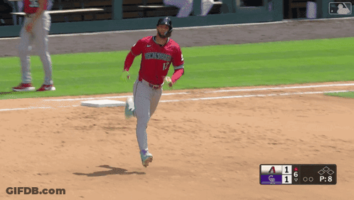 Baseball Player In Rockies Jersey Running To Base GIF