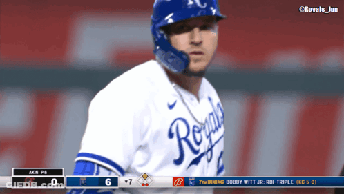 Baseball Player In Royals Uniform In Front Of Scoreboard GIF