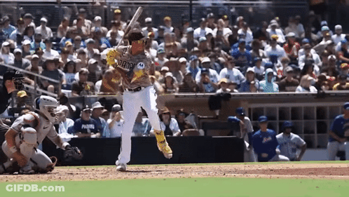 Baseball Player In San Diego Uniform Swings Bat GIF