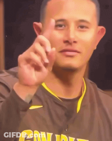 Baseball Player In Striped Jersey On Bench GIF
