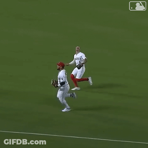 Baseball Player In White Jersey Number 9 Sliding Into Base GIF
