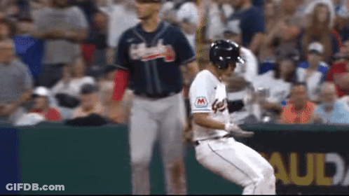 Baseball Player In White Uniform With Letter M GIF