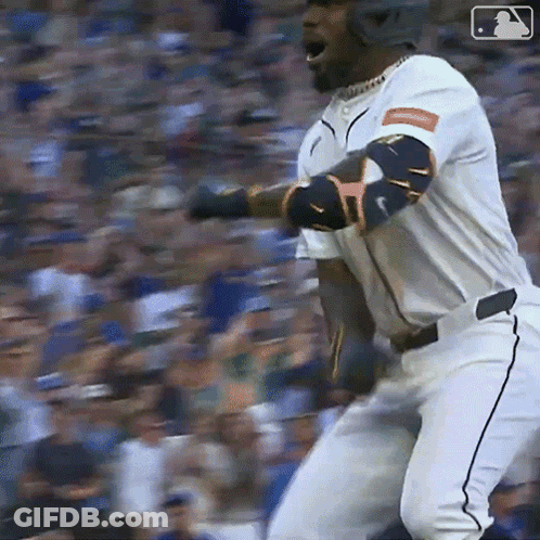 Baseball Player In White Uniform With MLB Logo GIF
