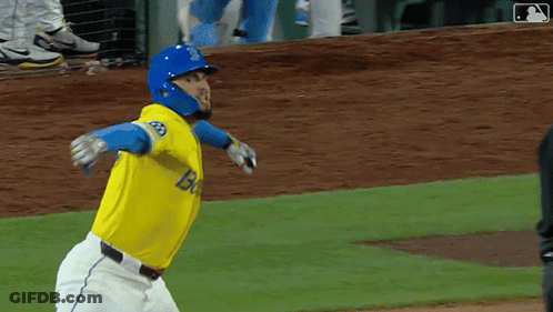 Baseball Player In Yellow And Blue Uniform With Letter B GIF