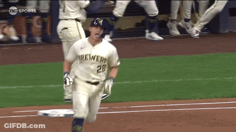 Baseball Player In Yellow Helmet And Blue Jersey Smiling And Waving GIF