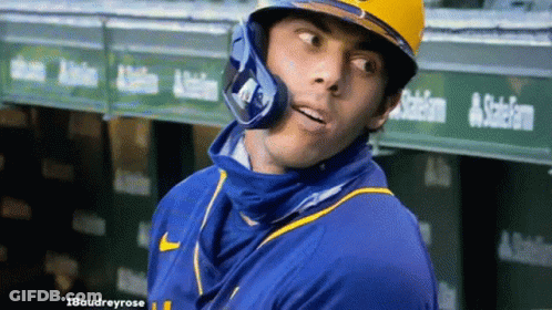Baseball Player In Yellow Helmet And Blue Nike Shirt GIF