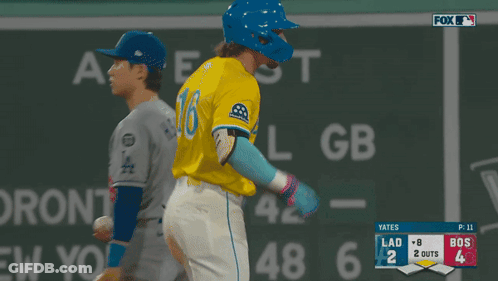 Baseball Player In Yellow Jersey Number 16 GIF