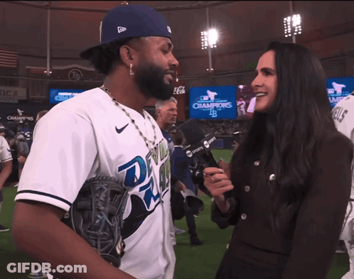 Baseball Player Interviewed By Woman With Microphone GIF