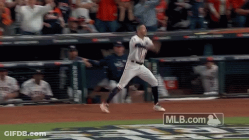 Baseball Player Jumping In Front Of MLB.com Ad GIF