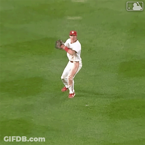 Baseball Player Jumping To Catch Ball GIF