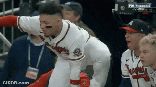 Baseball Player Kneeling In Dugout GIF