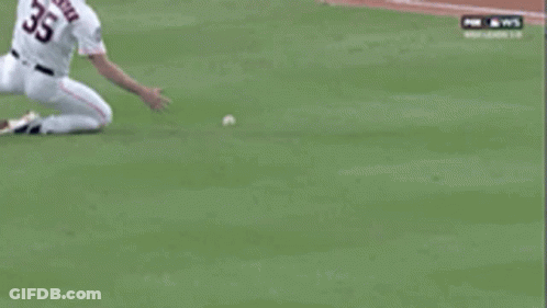 Baseball Player Lying On Field GIF