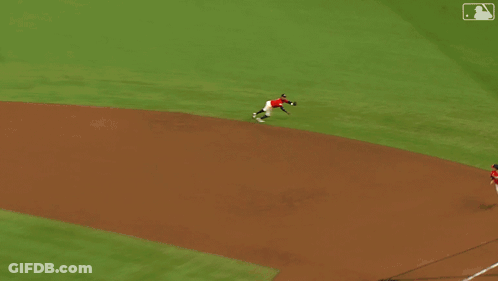 Baseball Player Lying On Grass Number 55 GIF