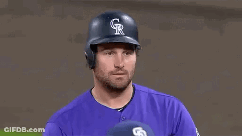 Baseball Player Making Funny Face In Purple Jersey GIF