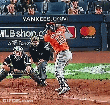 Baseball Player Number 10 Swinging At Ball GIF
