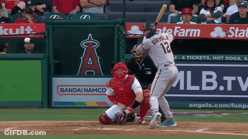 Baseball Player Number 12 Swinging At Pitch GIF